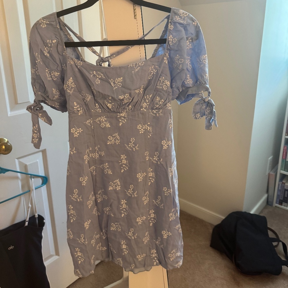 blue and white dress with flower details
